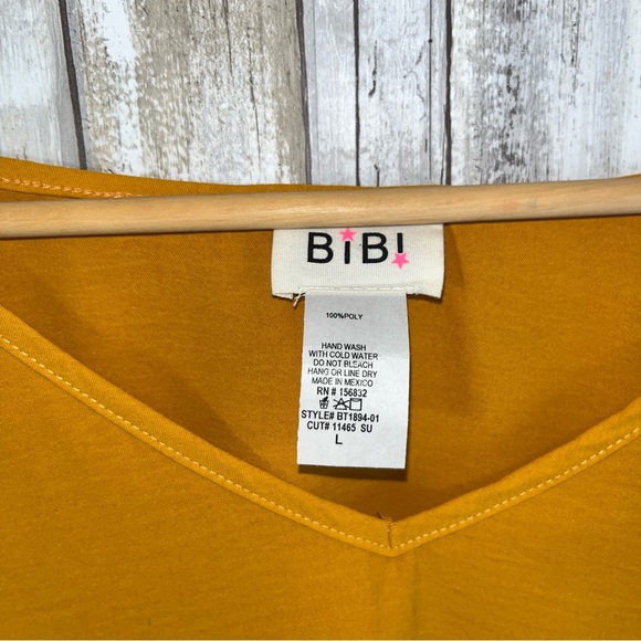 BiBi Mustard Oversized High Low Pocket Blouse - Picture 6 of 6
